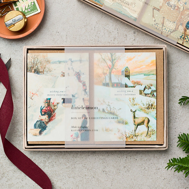 Katie Leamon greeting card box with scenic designs on a light gray surface.