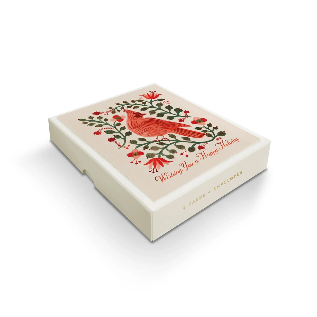 Cardboard box with a red cardinal design and text on a white background