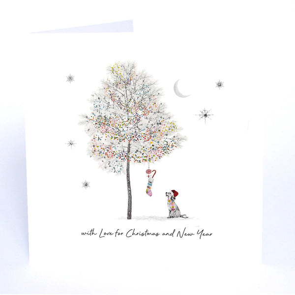 Illustration of a dog looking at a decorated Christmas tree with colorful ornaments on a white background.