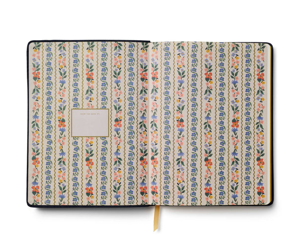 Notebook with floral pattern on a white background