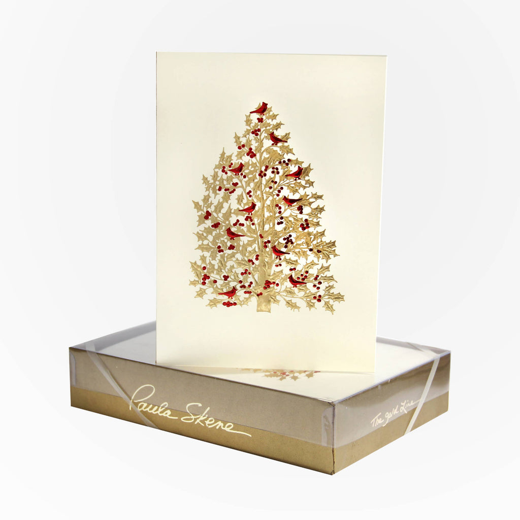 Christmas card with a tree design and birds, featuring the brand 'Paula Skene'.