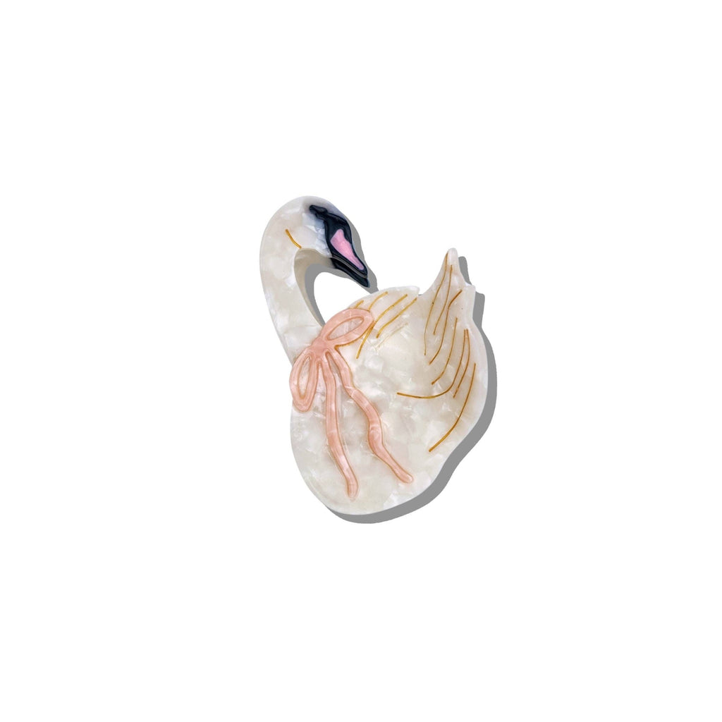 Decorative swan figurine on a white background