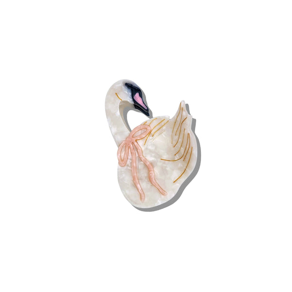Decorative swan figurine on a white background