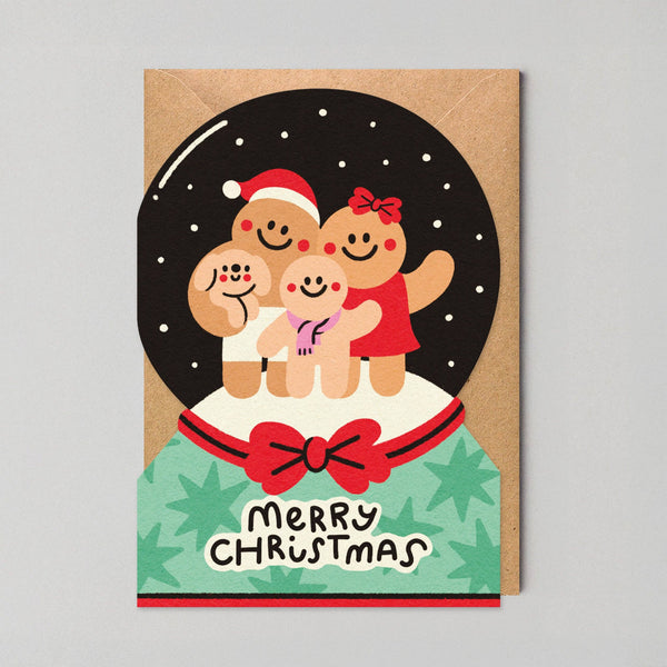 Gingerbread family Christmas card with a decorative bow on a gray background