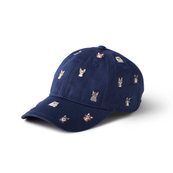 Navy blue cap with embroidered cat designs on a white background
