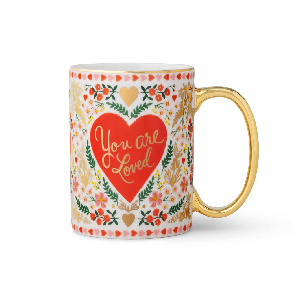 Mug with floral design and 'You are Loved' text on a white background