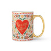 Mug with floral design and 'You are Loved' text on a white background
