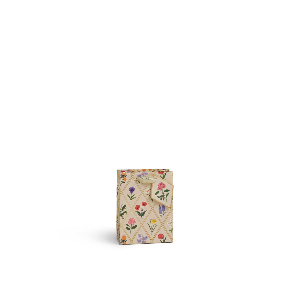 Small gift bag with floral pattern on a white background