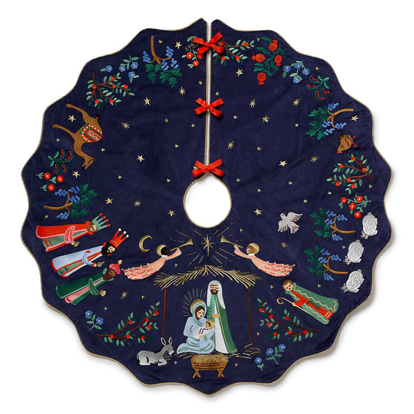 Decorative Christmas tree skirt with nativity scene design on a white background
