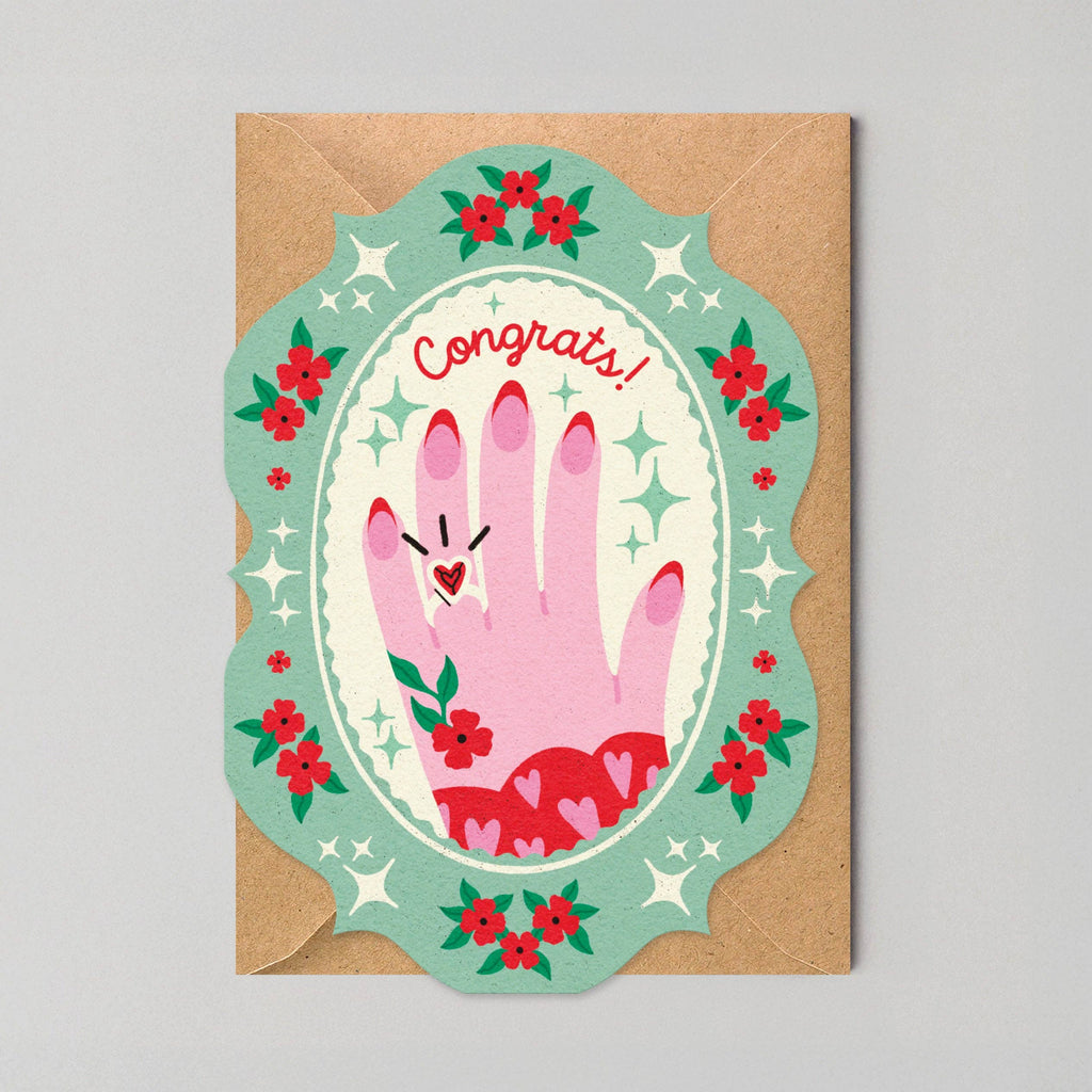 Greeting card with hand illustration and 'Congrats!' text on a gray background