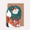 Christmas card with a cat illustration and 'Meowy Christmas' text on a brown background