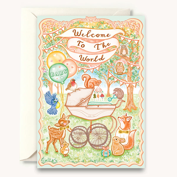 Greeting card with baby-themed illustrations and 'Welcome to the World' text on a light blue background.