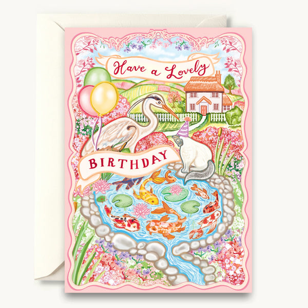 Birthday card with a pond scene, stork, and text 'Have a Lovely Birthday' on a white background.