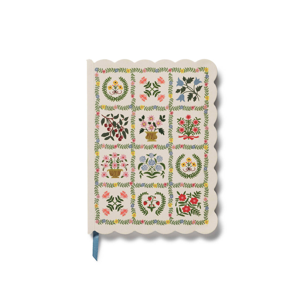 Notebook with floral and geometric pattern on a white background