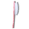 Hairbrush with a pink handle and white bristles on a white background