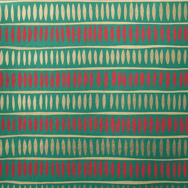 Patterned fabric with red and beige shapes on a green background