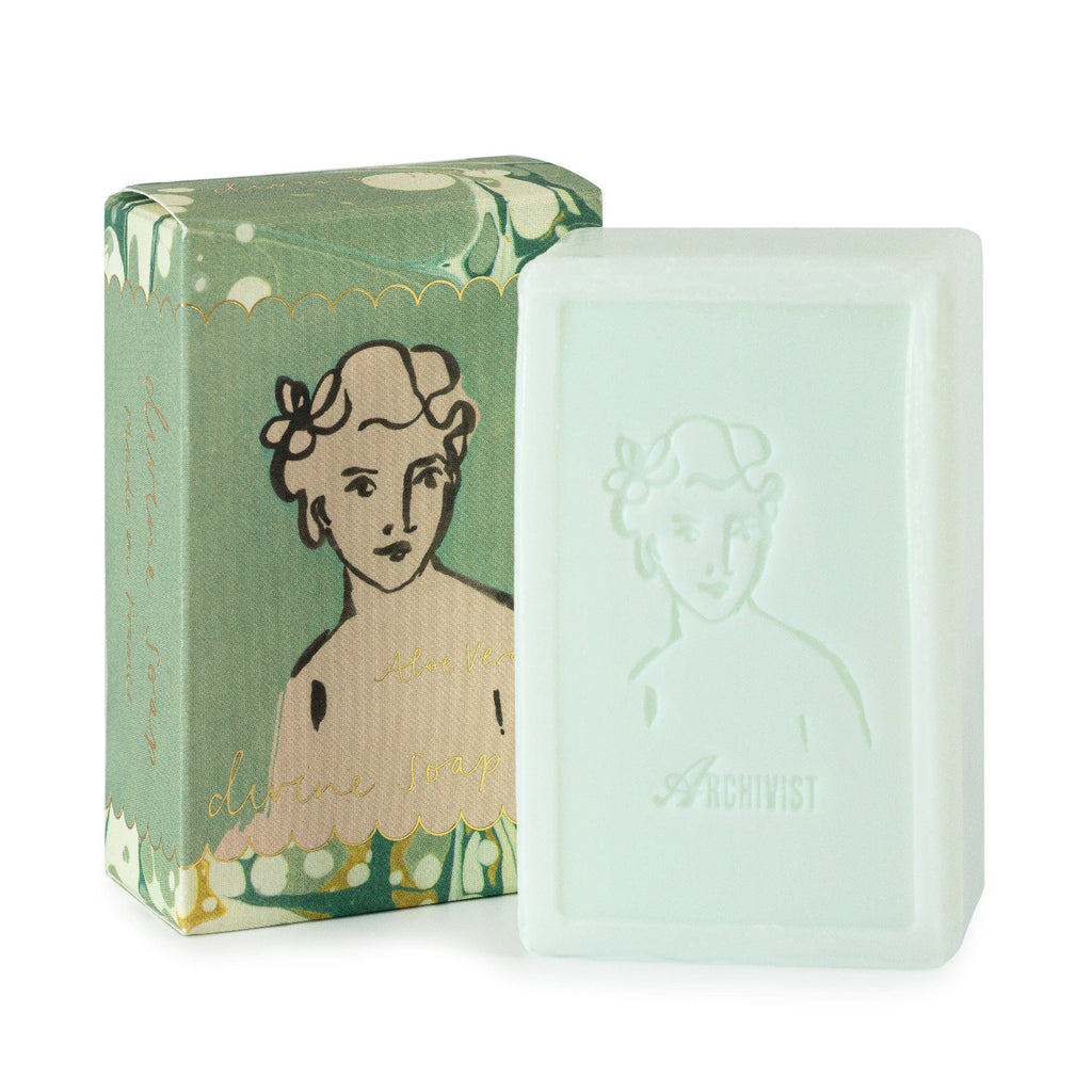 Bar of soap with a decorative packaging featuring an illustration on a white background