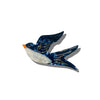 Decorative swallow-shaped ornament on a white background
