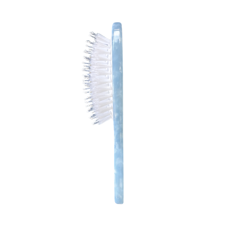 Cleaning brush with a gradient blue handle on a white background