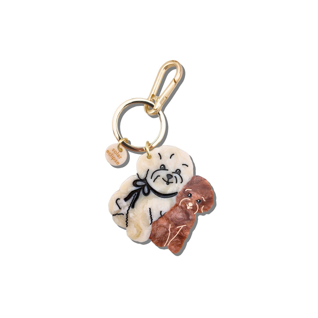 Keychain with a design of a bear and a bear cub on a white background