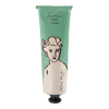 Hand cream tube with a design of a woman's face on a green background