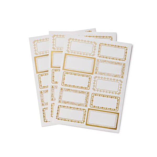 Sheet of white labels with gold borders on a white background