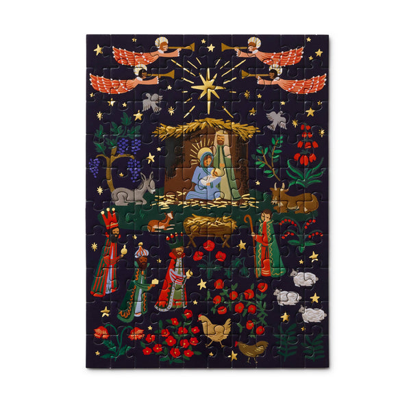 Decorative nativity scene with colorful figures and elements on a dark background
