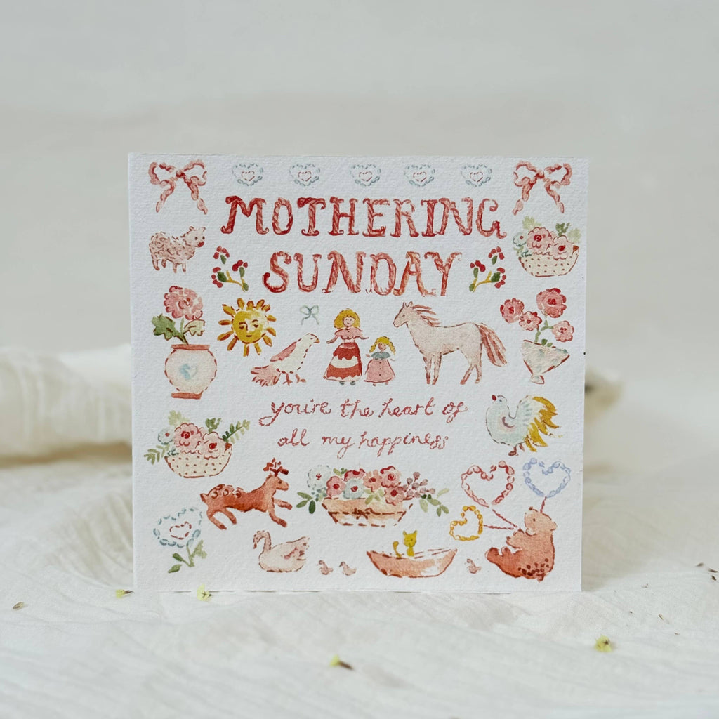 Greeting card with 'Mothering Sunday' text and illustrations on a white background