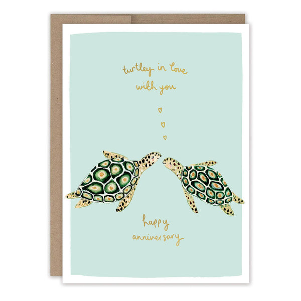 Greeting card with two turtles and text on a light blue background