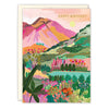 Colorful birthday card with a mountain landscape and 'Happy Birthday' text.