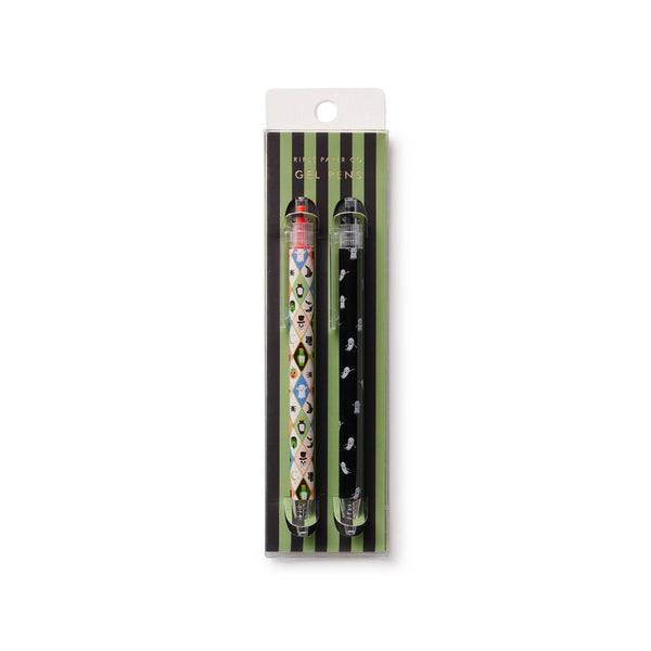 Two decorative pens in packaging on a white background
