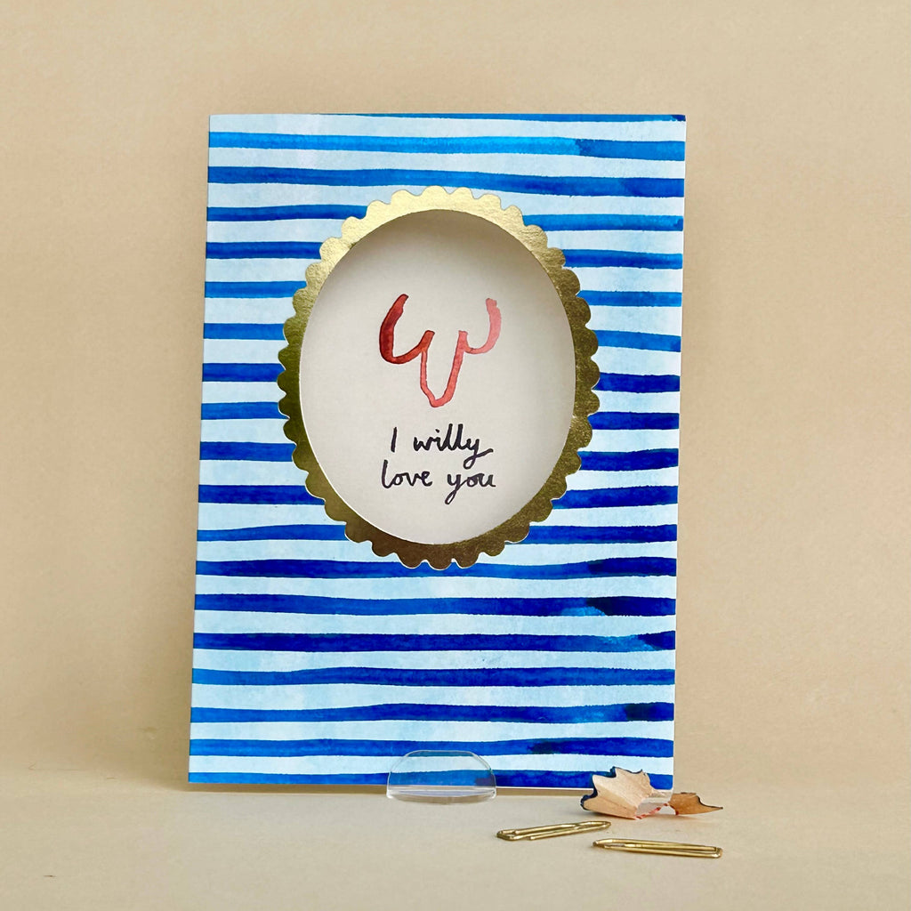 Card with blue and white striped design and gold text on a beige background