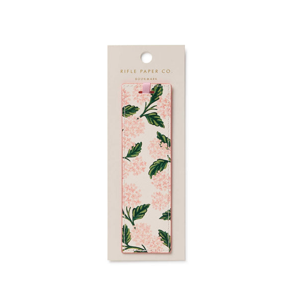 Floral and leaf patterned product in a Rifle Paper Co. packaging on a white background
