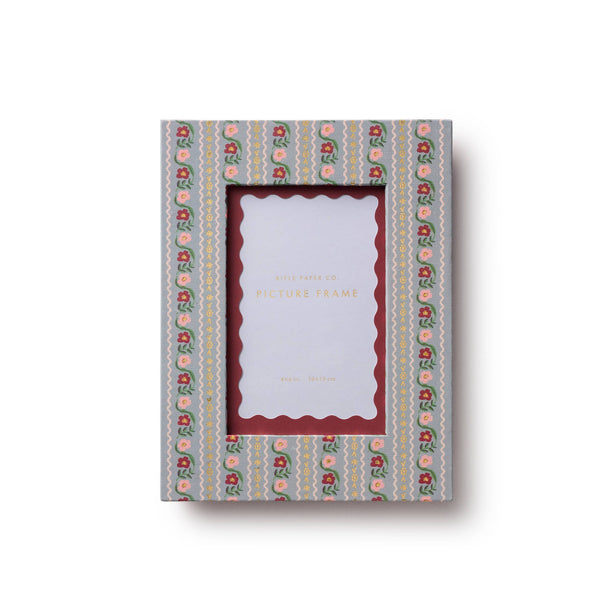 Decorative photo frame with a patterned border on a white background