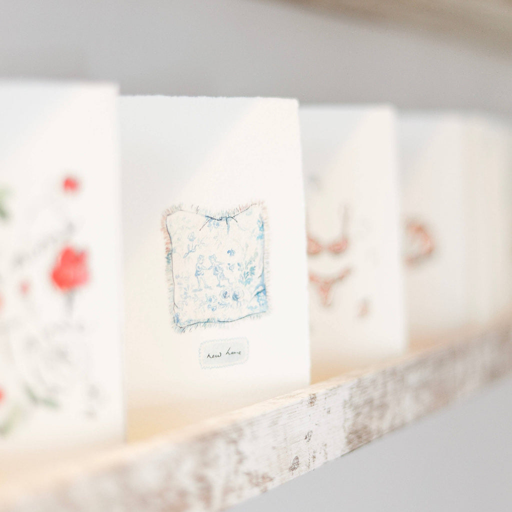 Small card with a decorative design on a blurred background