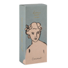 Product packaging with a stylized illustration of a woman's face on a light blue background