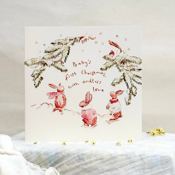 Christmas card with festive illustrations and text on a white background