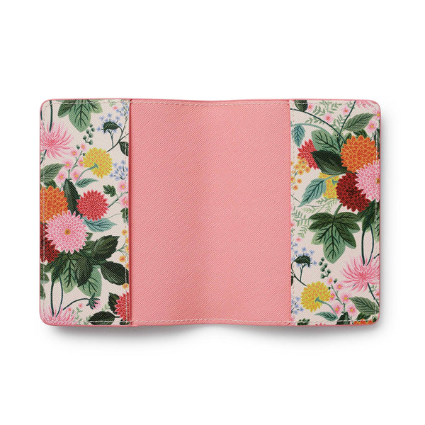 Floral-patterned passport holder with pink interior on a white background