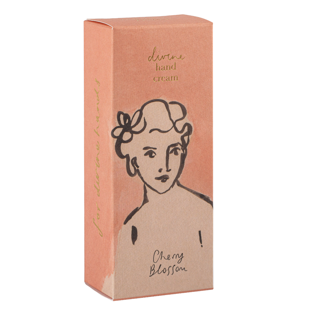 Box of cherry blossom hand cream with a minimalist design on a white background