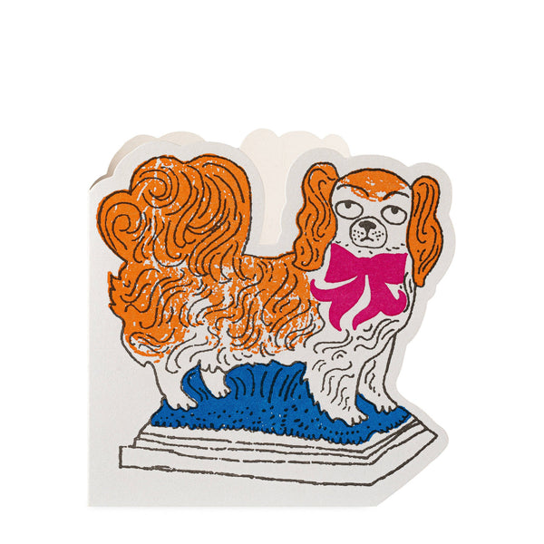 Decorative sticker of a dog with a pink bow on a white background