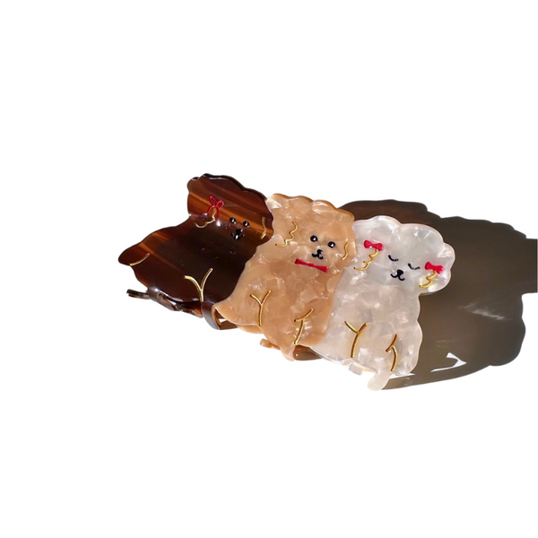 Four small animal figurines on a white background