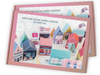 Christmas Village Advent Calendar DIY Craft Kit packaging with colorful houses on a white background