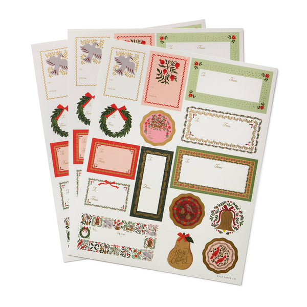 Set of Christmas-themed stationery sheets with various designs on a white background