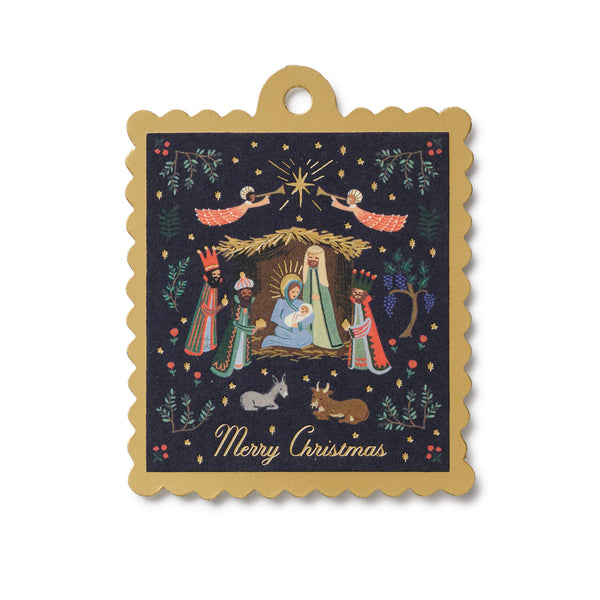 Decorative Christmas tag with nativity scene illustration on a white background