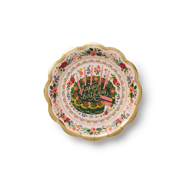 Decorative paper plate with 'Happy Birthday' text and floral design on a white background