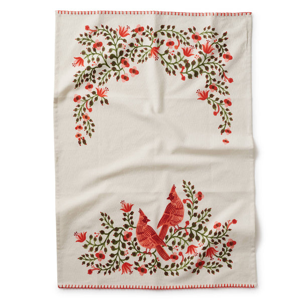 Decorative towel with floral and cardinal design on a white background