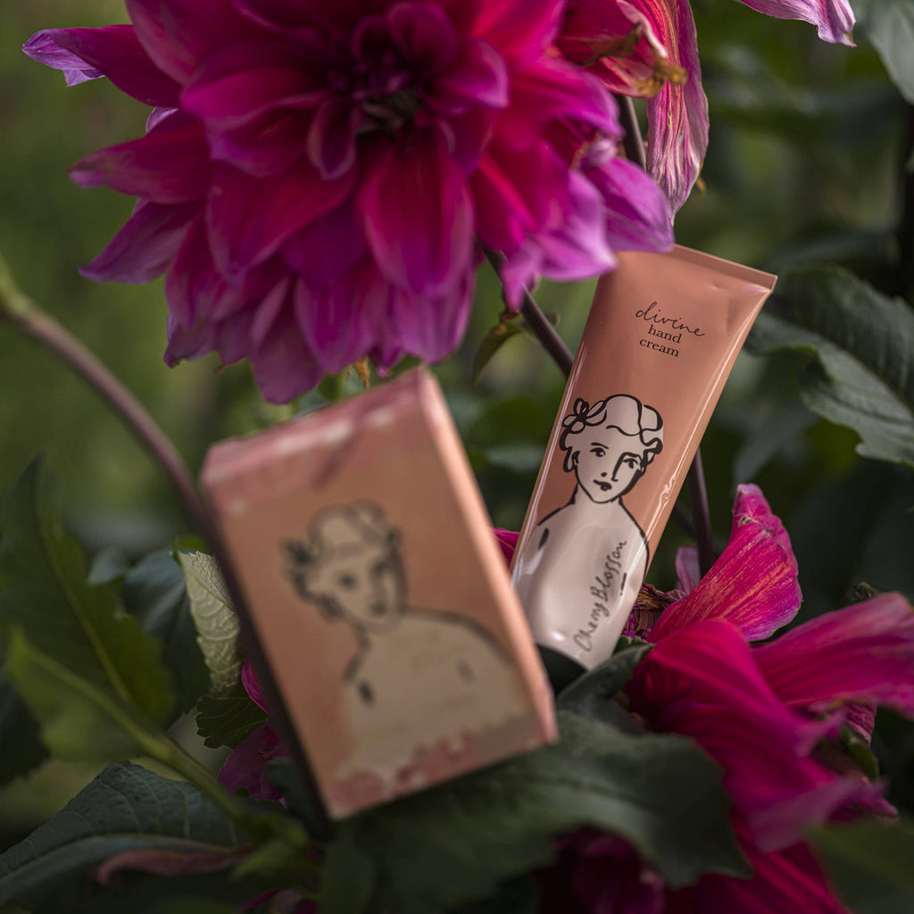 Hand cream and packaging with floral background