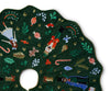 Decorative green tree skirt with embroidered festive designs on a white background