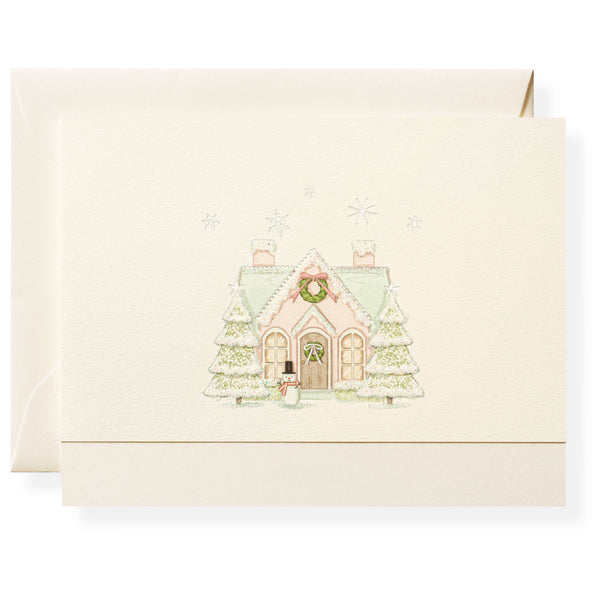 Greeting card with a festive house and trees design on a white background