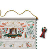 Decorative Advent calendar with nativity scene and angel ornament on a white background